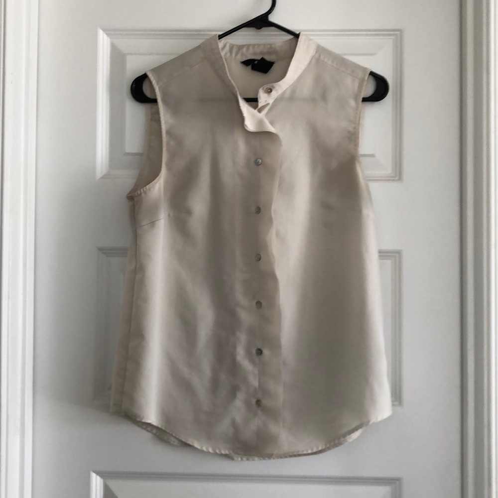 Ivory sleeveless mandarin collar blouse